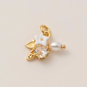 Detail of 18K gold-plated pendant with white flower, large zircon and pearl accent