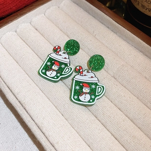 Glittery green snowman mug earrings with festive candy cane for Christmas style