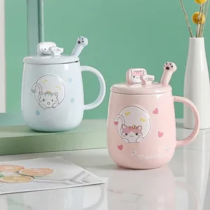 Cartoon cat ceramic mug set with lid and paw spoon in pastel pink and blue colors