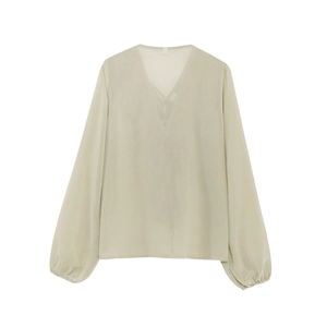 Women's light green V-neck lantern sleeve sheer shirt with criss-cross lace-up front