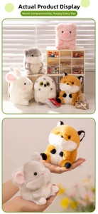 Detailed view of soft plush animal charms including pig, hamster, and rabbit with keychains