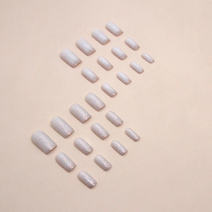 White glitter square press-on nails with minimalist nude gradient and glossy finish