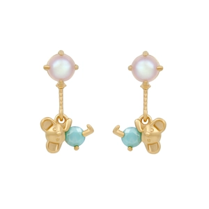Detail of bear earrings with white pearls and light blue faceted gemstone charms