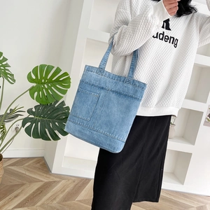 Borsa tote in denim azzurro con tasca esterna da donna, borsa a spalla grande e casual