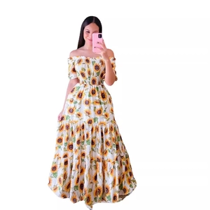 Summer off-the-shoulder maxi dress with sunflower print and a cinched waist design