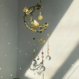 Handmade moon crystal wind chime with green leaf rope and pink stone butterfly accents