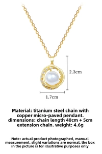 Detail view of rotating nest pearl pendant with measurements for size and chain length