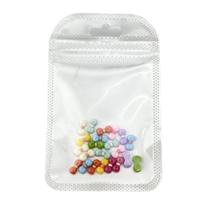 Colorful resin bow nail art charms in a clear bag for DIY manicure decoration