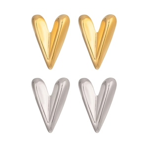Minimalist gold and silver heart stud earrings with high-polish metallic finish