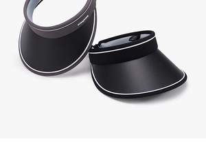 Detail view of black and grey adjustable UV protection sun visors with matte PVC brims