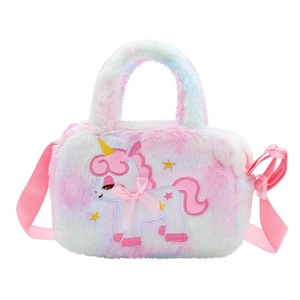 Close-up of unicorn embroidery and pink ribbon on macaron plush shoulder bag