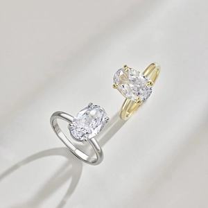 Silver and gold S925 sterling silver rings with oval-cut cubic zirconia in four-prong setting