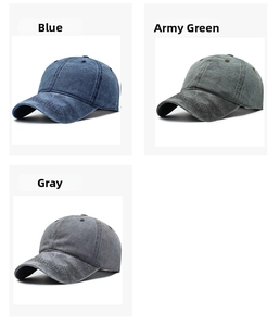Detailed view of washed cotton baseball caps in blue, army green, and grey colors