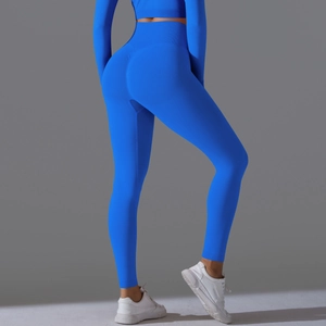 Rear view of electric blue seamless high-waisted yoga set with scrunch butt detail