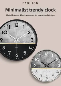 Detail view of wall clock featuring metal frame, silent movement and marble texture face