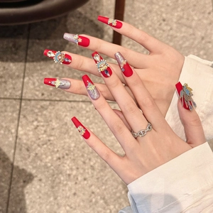 Traditional Chinese style bridal press-on nails in vivid red with 3D phoenix decorations