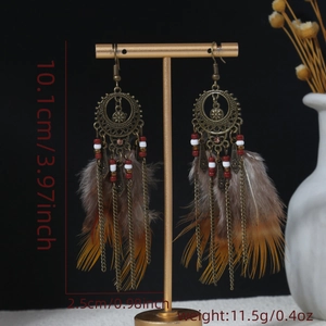 Detail showing dimensions of vintage bohemian feather earrings with beads and chain
