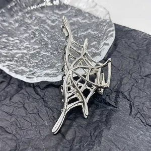 Silver spider web alloy hair claw clip with elegant hollow metal butterfly wing design
