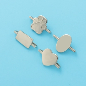 Polished stainless steel charms in heart, oval, and paw shapes for smartwatch bands