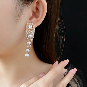Luxury long pearl tassel earrings with gold-toned plating and crystals for women