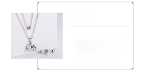 Detailed view of silver 316 stainless steel hollow elephant pendant necklace and stud set