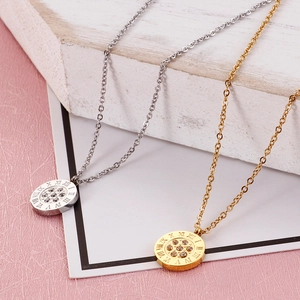 Golden and silver minimalist round Roman numeral necklaces with crystal diamonds set in steel