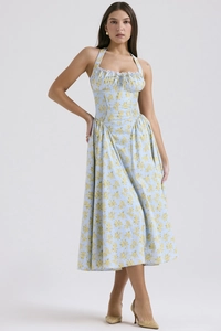 Detail of light blue floral midi dress featuring halter neck and ruched bodice detail