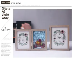 Three-fold light gray wooden 5x7 frame with dried flowers and raffia paper fill