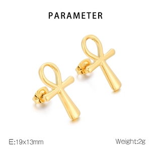 Macro view of 18K gold-plated stainless steel Ankh cross earrings showing size and weight