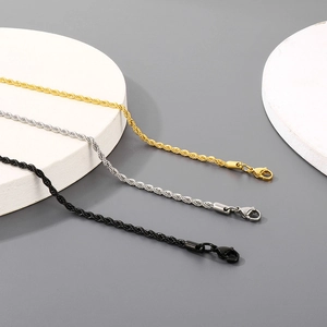 Detailed view of 3mm braided stainless steel twist chains in gold, silver, and black finishes