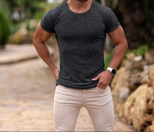 Close-up of men's dark grey slim fit T-shirt featuring high-elastic vertical ribbed texture