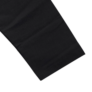 Close-up of double-needle stitching on the cuff of a black linen blend casual shirt