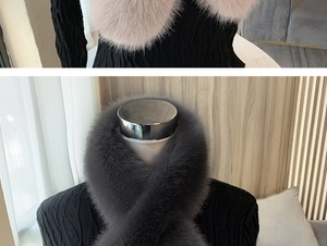 Detail of soft faux fox fur scarf in dusty pink and dark gray showing plush texture