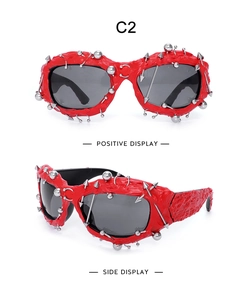 Detailed views of red punk sunglasses featuring silver metal studs and spikes accents