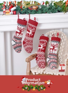 Close-up of knitted Christmas stockings with reindeer patterns hanging by a fireplace