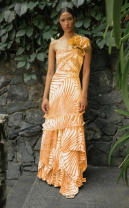 Detail of one-shoulder long dress with orange 3D flower and tropical leaf print