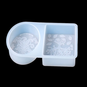 Macro detail of silicone soap mold featuring intricate floral and tree of life patterns