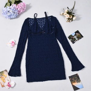 Flat lay of navy blue lace two-piece dress with V-neck, bow detail and flared sleeves
