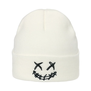 White ribbed knit beanie featuring a black embroidered smiley face in streetwear style