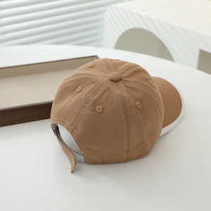 Rear view of brown cotton kids baseball cap showing adjustable strap and white trim