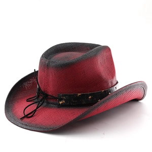 Detail of red and black gradient woven cowboy hat with star studded band and drawstring