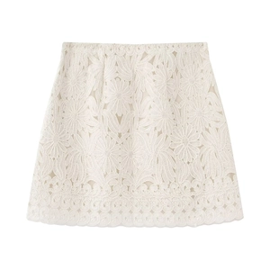 Elegant white lace mini skirt with intricate floral embroidery and layered design