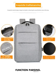 Detail of grey business backpack showing thickened handle and breathable shoulder straps