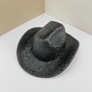 Detail of black glitter cowboy hat with metallic texture for St. Patrick's Day parties