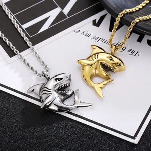 Polished stainless steel shark pendant necklaces in gold and silver with rope chains