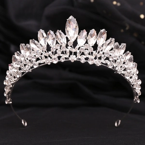 Detailed close-up of sparkling marquise and round crystals on a silver bridal crown