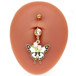 Détail du piercing nombril papillon plaqué or avec zircon blanc et motifs de tulipes
