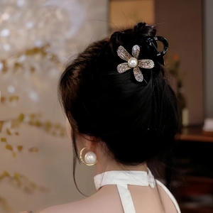Sparkling crystal flower hair claw clip with large pearl on elegant black base for women