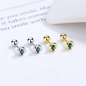 Detail of S925 sterling silver Christmas tree stud earrings in gold and silver finishes