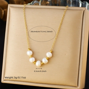Close-up of gold chain necklace with 5mm white pearls and length measurement details